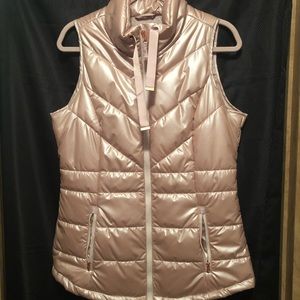 Maurice’s brand rose gold, zipper vest. Size Medium.